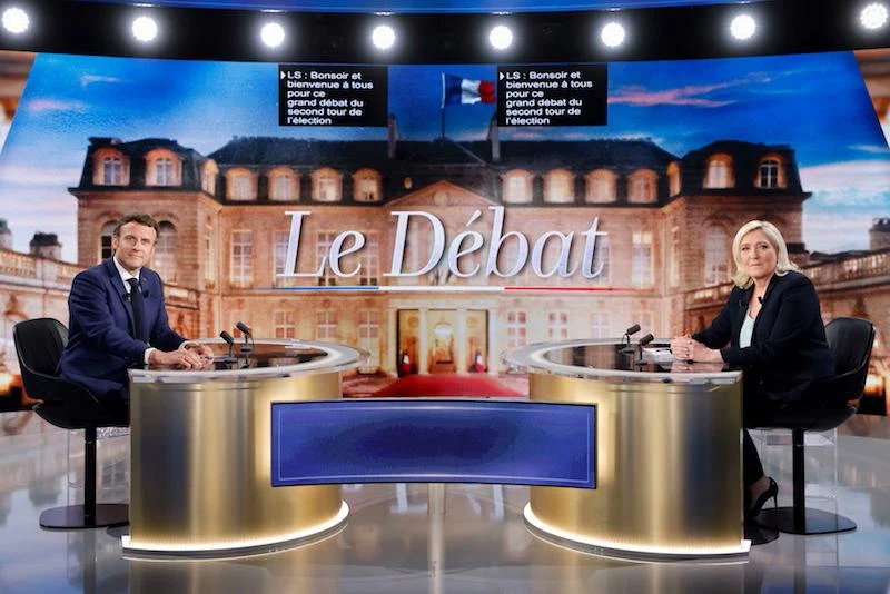 French presidential debate: Macron slams Le Pen over Muslim headscarf ban plans, ties with Russia