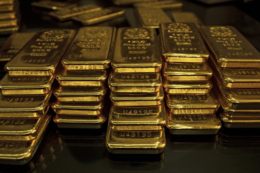 Zimbabwe introduces gold coins as local currency tumbles
