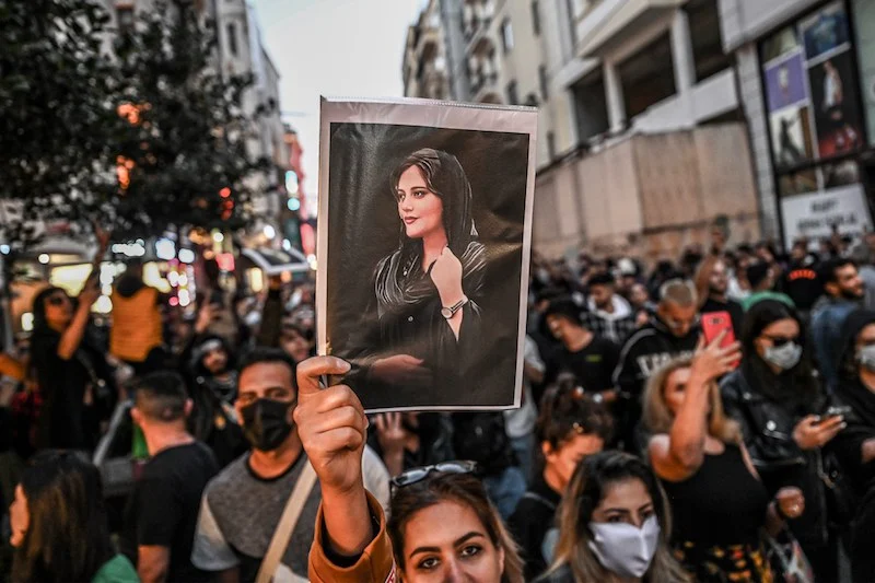 Iran's President 'saddened' by Amini's death