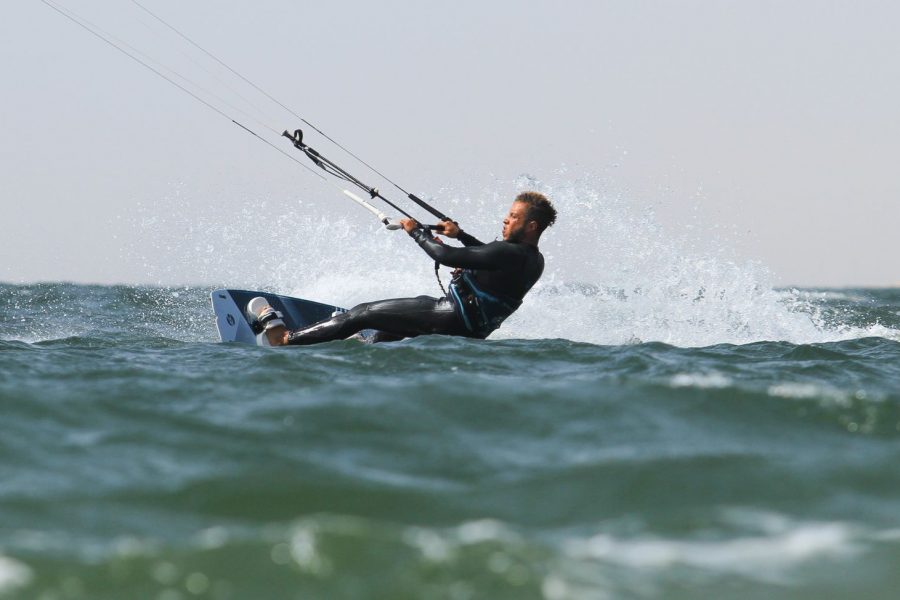 Profile: Moroccan young man's journey to wave chase, full-time