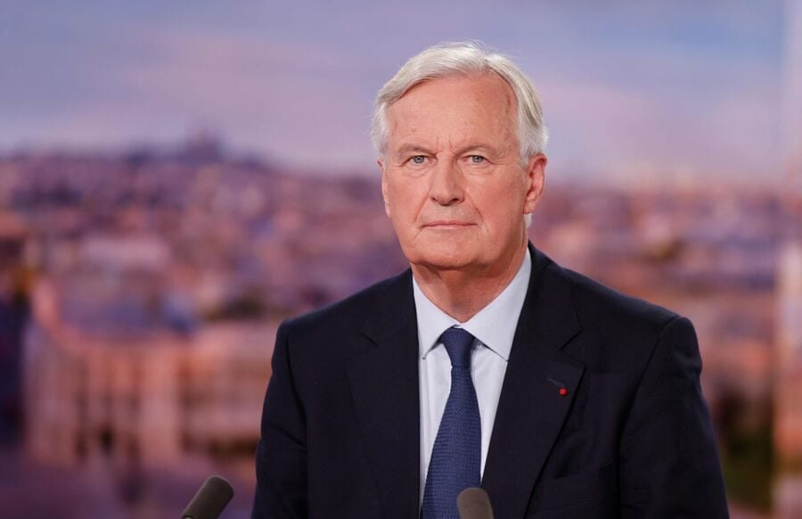 France's PM risks tumbling in hostile parliament vote