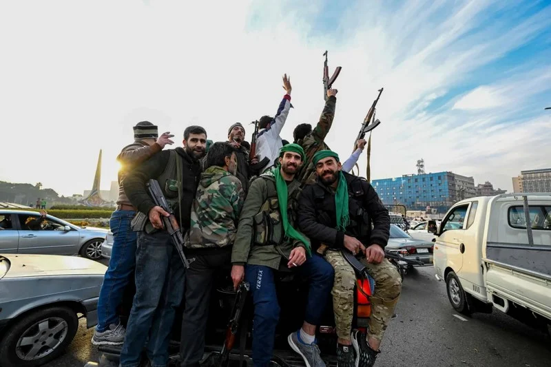 Syria ex-rebel military chief says to dissolve armed wing
