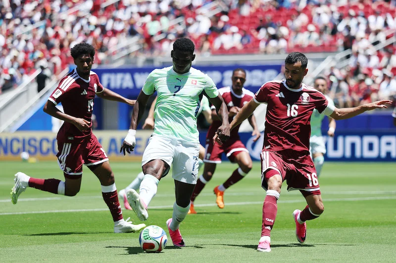 Qatar earn first ever World Cup point with late goal