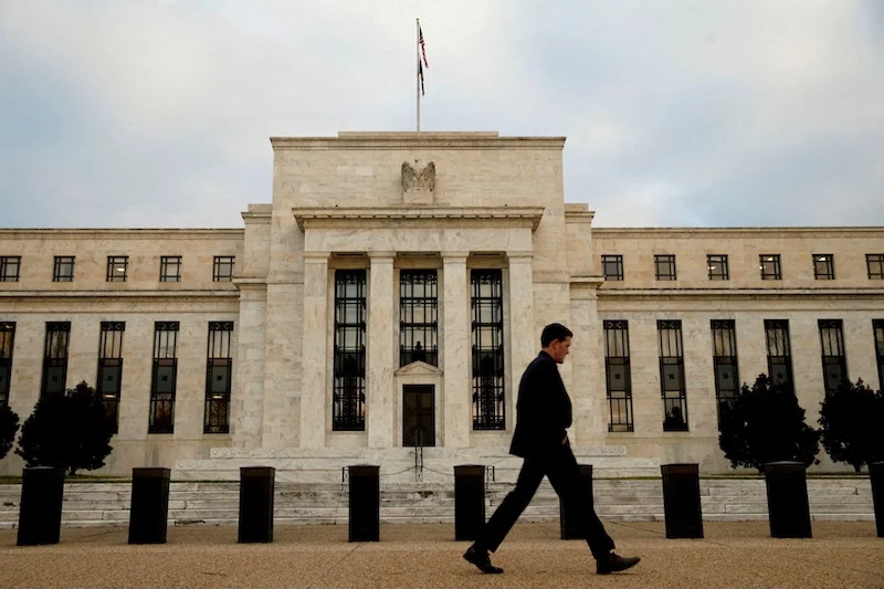 US Fed holds interest rates steady, says committed to fighting inflation